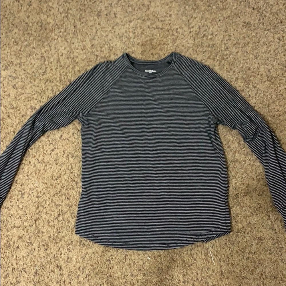 Men's black and white striped shirt.